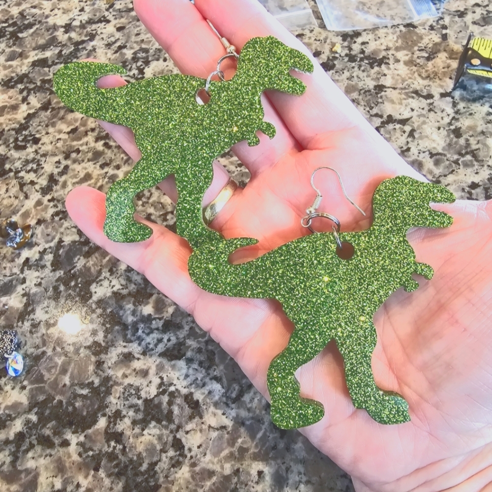 Green glitter acrylic T-Rex Earrings. Dino dinosaur. Lightweight sparkle sparkly